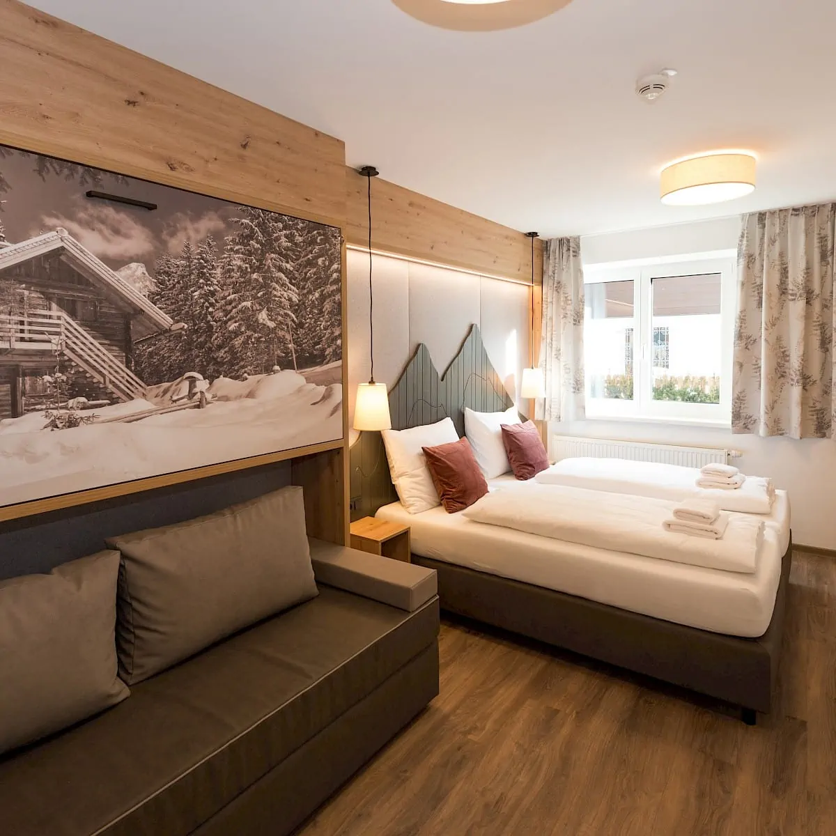 Schlafzimmer Zirm 3 | Zirmhof Apartments in Saalbach