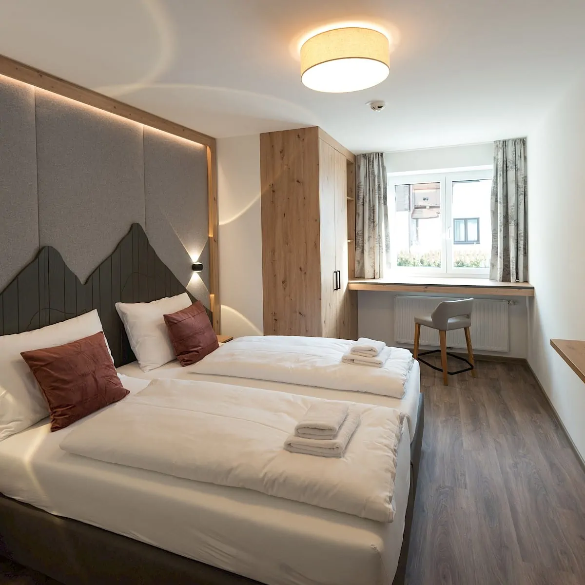 Bedroom Zirm 3 | Zirmhof Apartments in Saalbach
