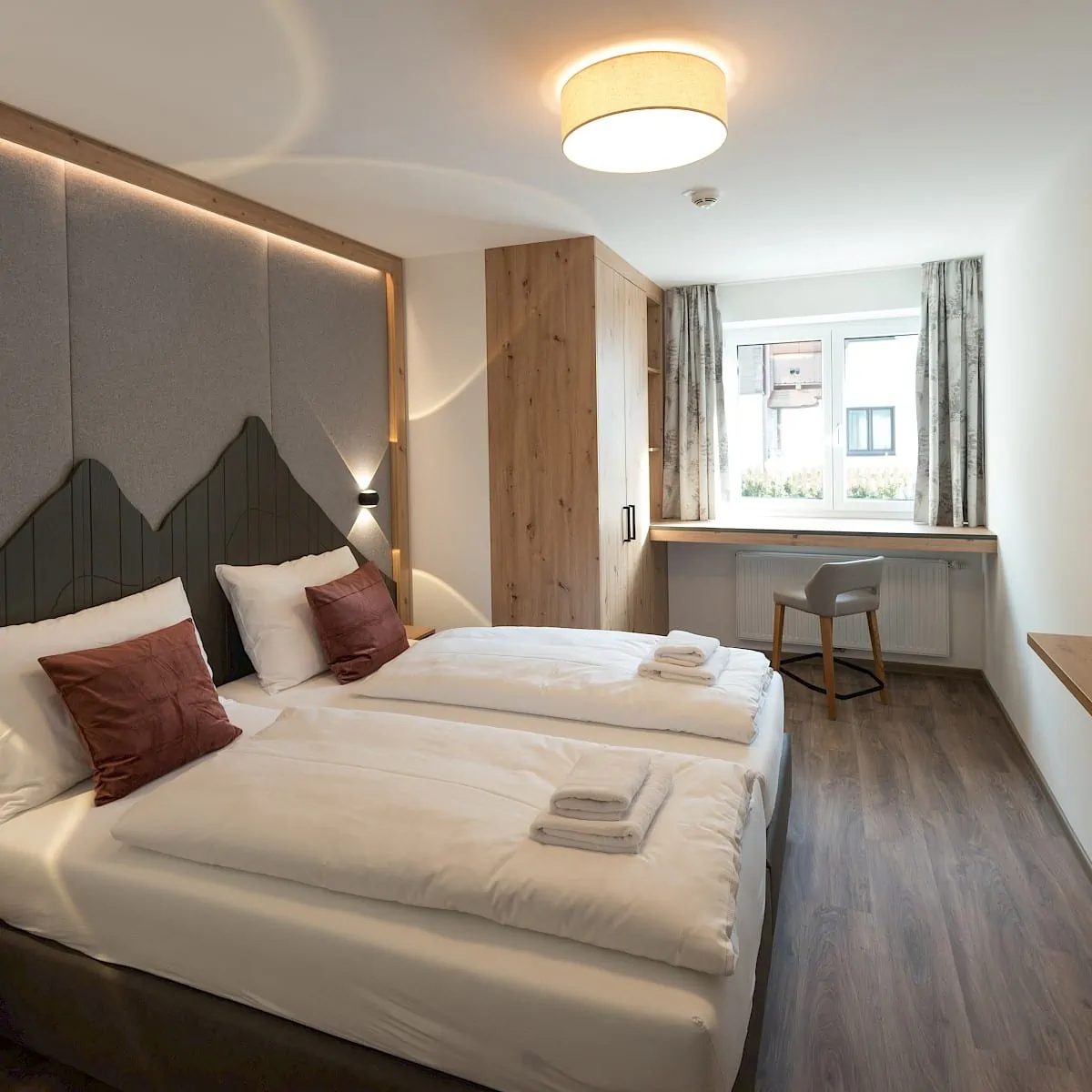 Schlafzimmer Zirm 3 | Zirmhof Apartments in Saalbach