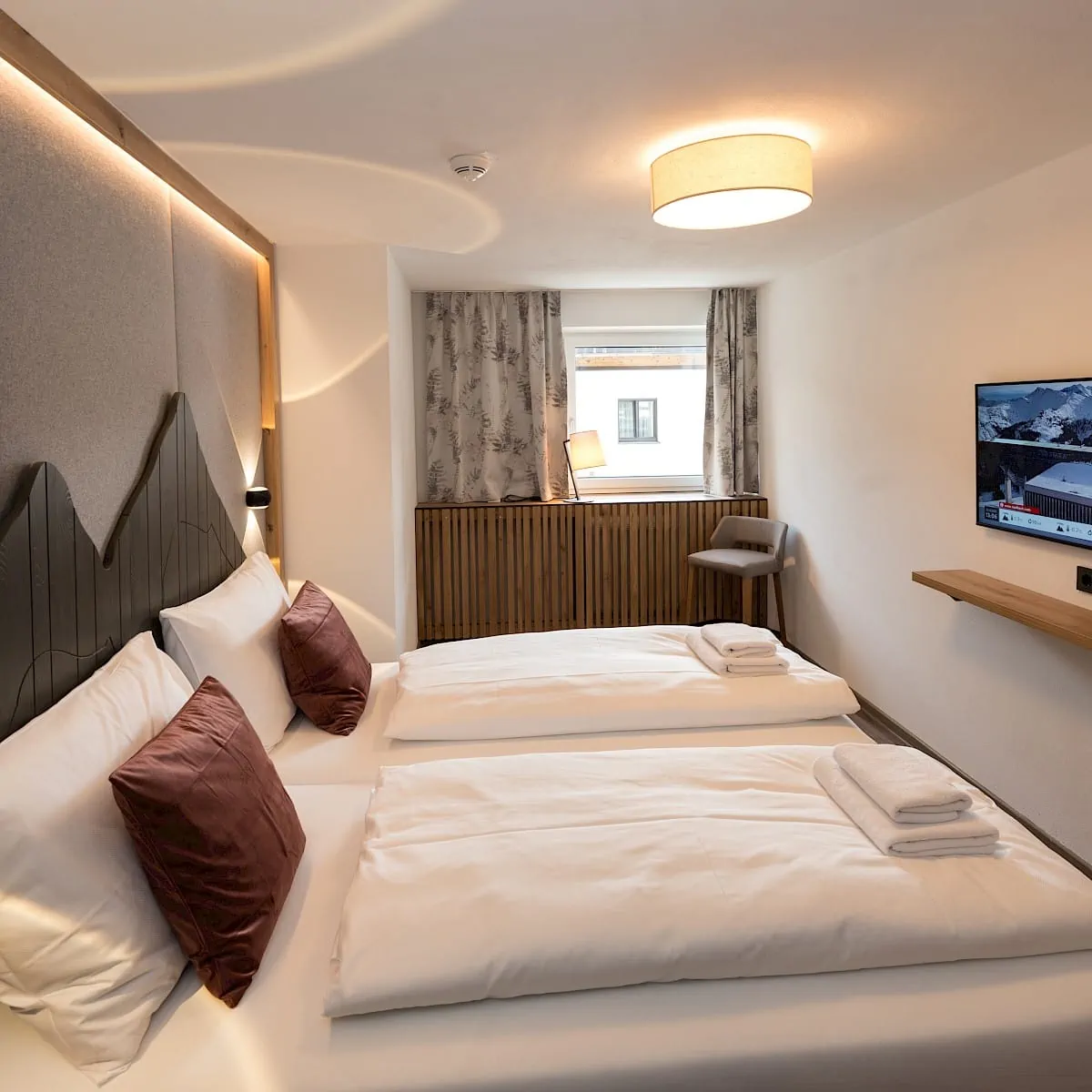 Bedroom | Zirmhof Apartments in Saalbach