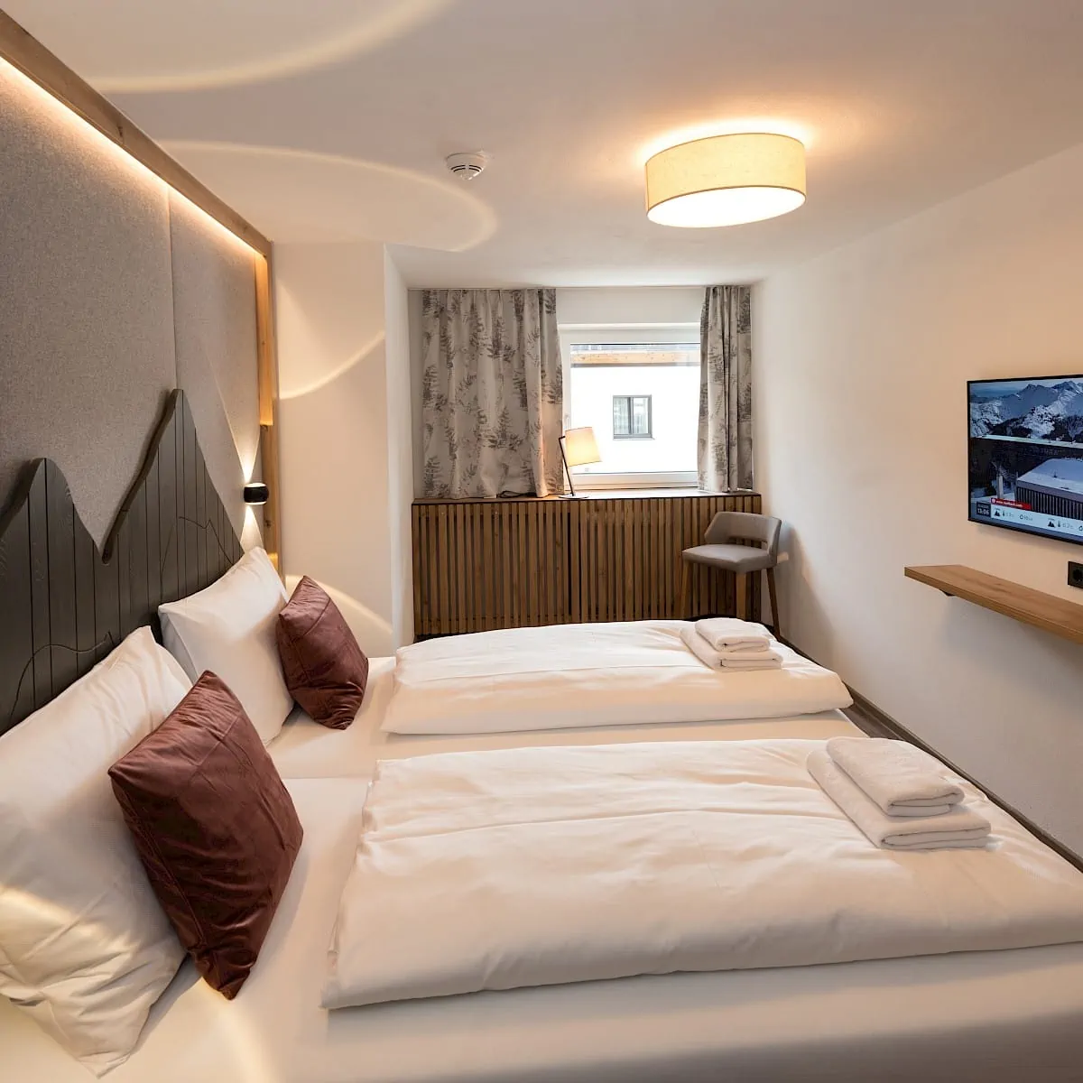 Schlafzimmer | Zirmhof Apartments in Saalbach