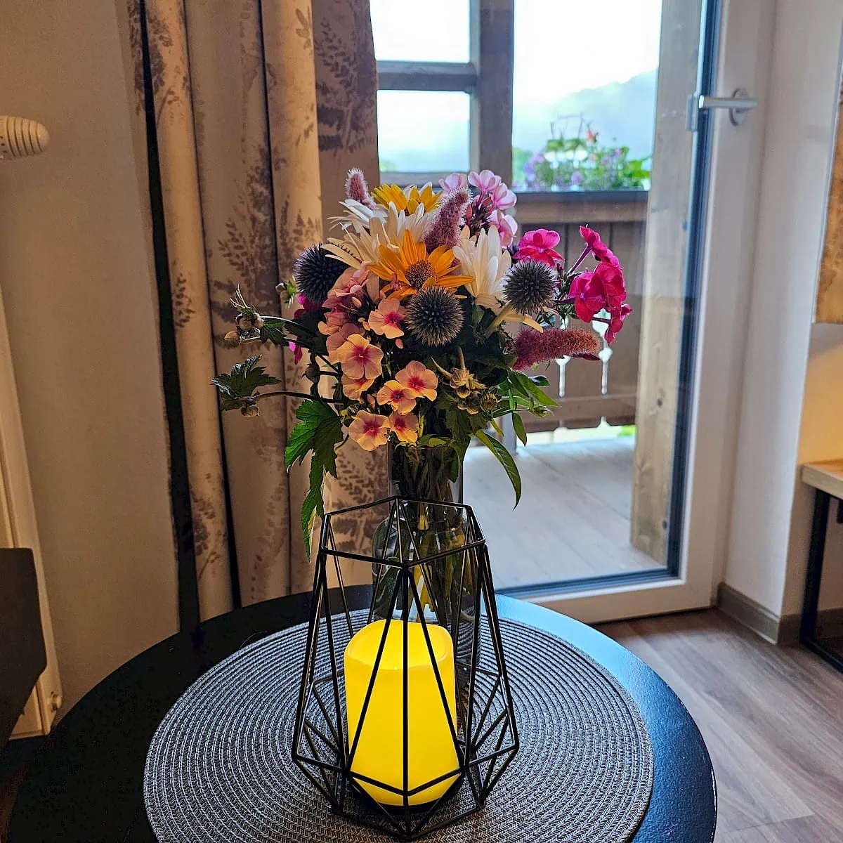Flowers and candle in Zirm 14